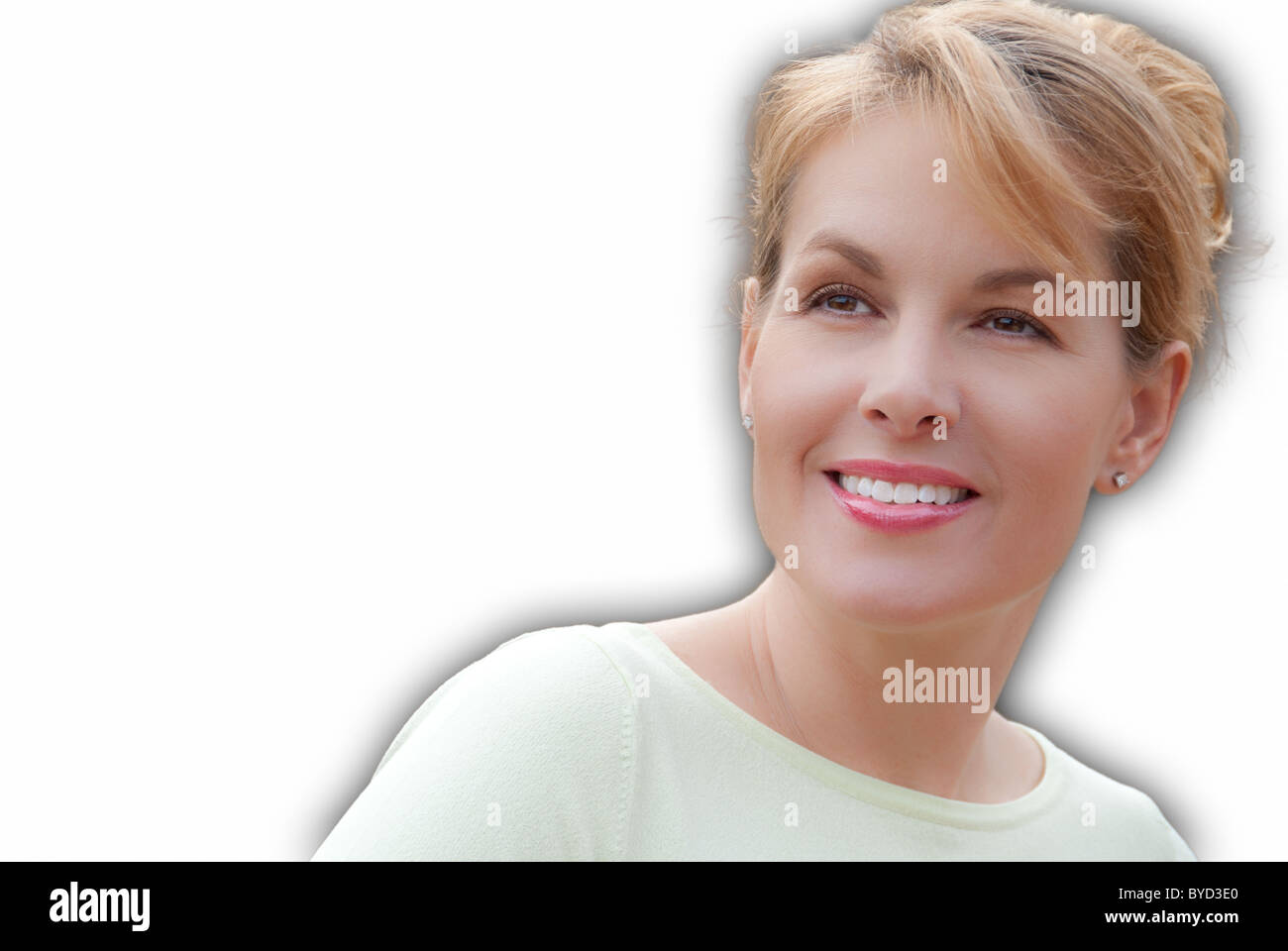 Porträt der glückliche Frau vor weißem Hintergrund Stockfoto