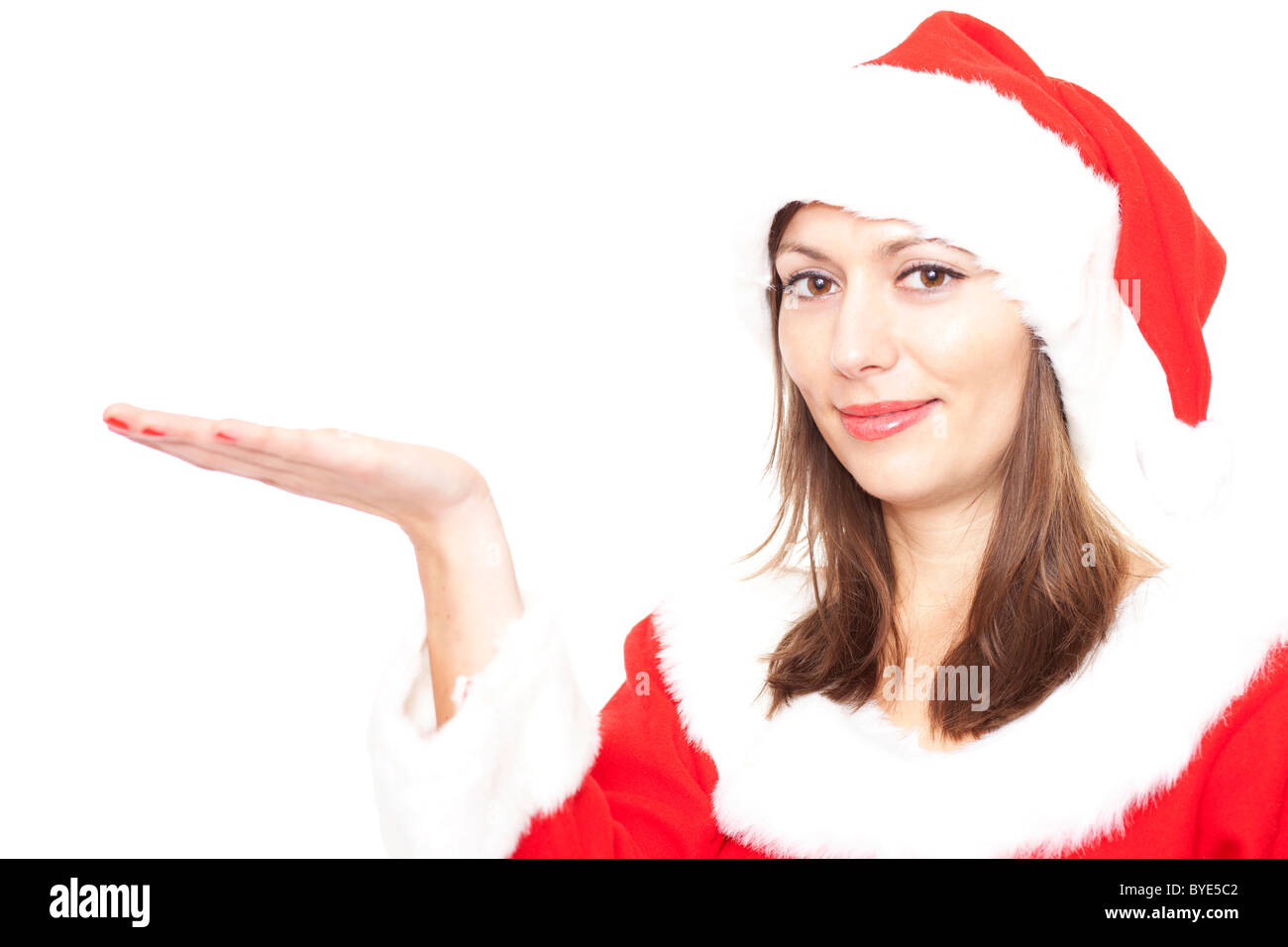 Frau im Weihnachtsmann-Kostüm hält ihre hand Stockfoto