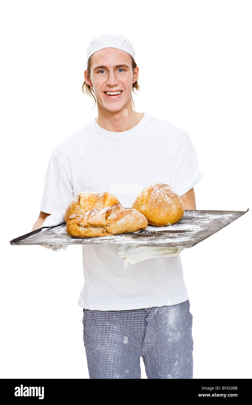 Studioportrait von männlichen Baker, die holding Tablett mit Brot Stockfoto