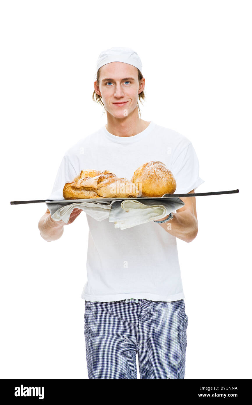 Studioportrait von männlichen Baker, die holding Tablett mit Brot Stockfoto