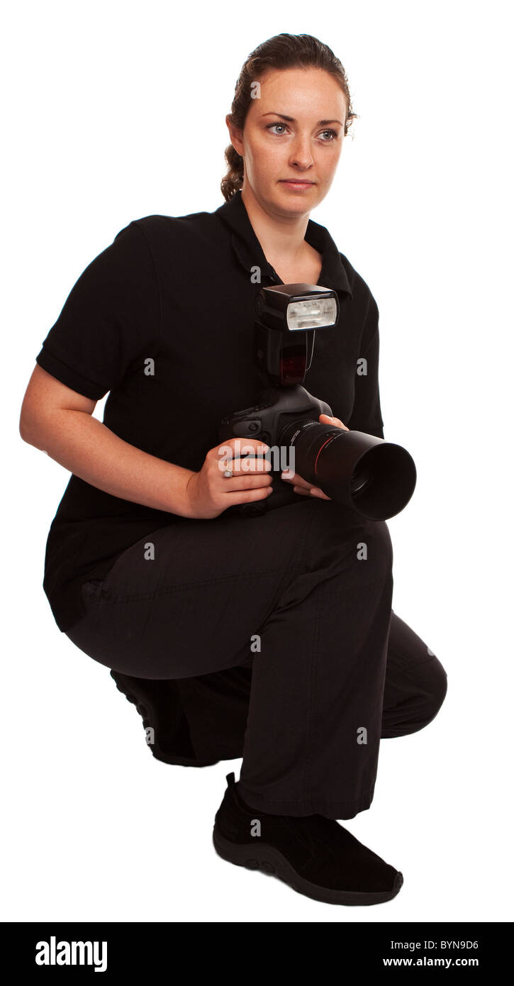 erwachsenes Weibchen mit professionellen Kamera vor einem weißen Hintergrund isoliert Stockfoto