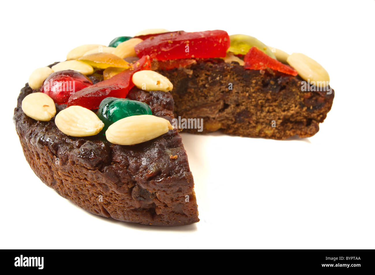 Italienischer Schokoladenkuchen Obst garniert mit Nüssen und Früchten glace. Stockfoto