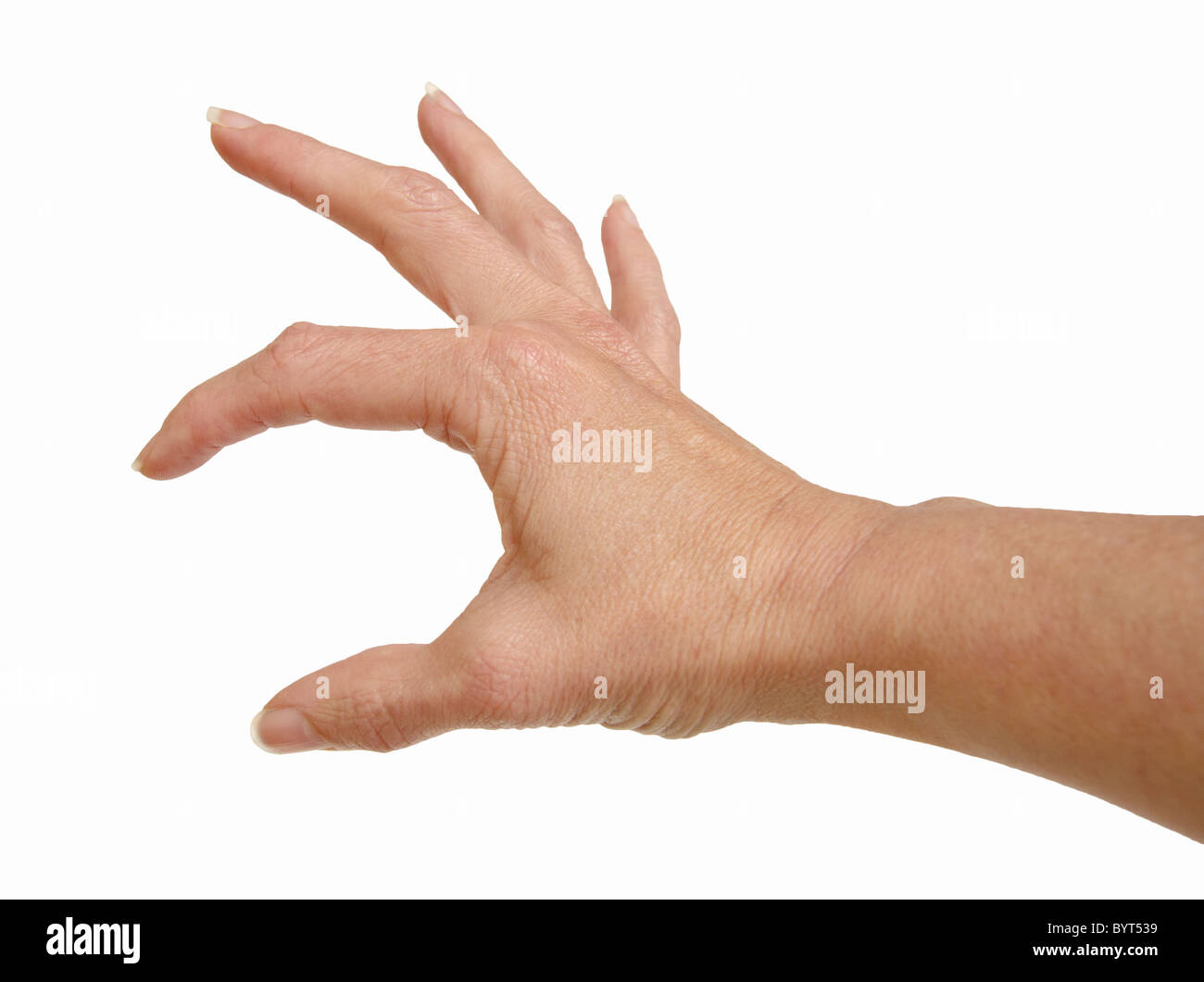 Weibliche menschliche Hand mit den Fingern hält so etwas Stockfoto