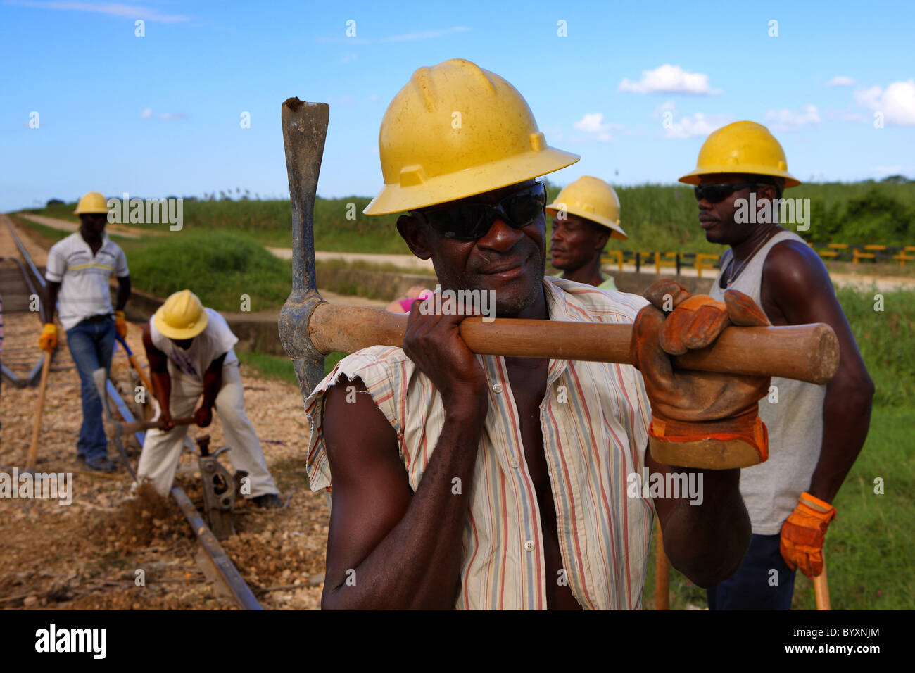 Karibik, Dominikanische Republik, Männer bei der Arbeit, rail Transport Zuckerrohr Stockfoto