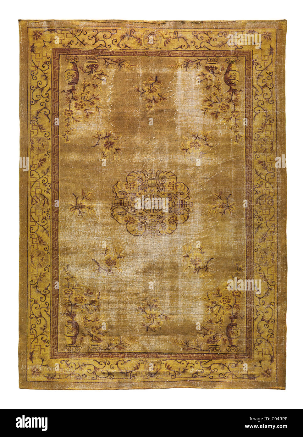 Gelbe Antike Teppich isoliert auf weißem Hintergrund mit Beschneidungspfad Stockfoto
