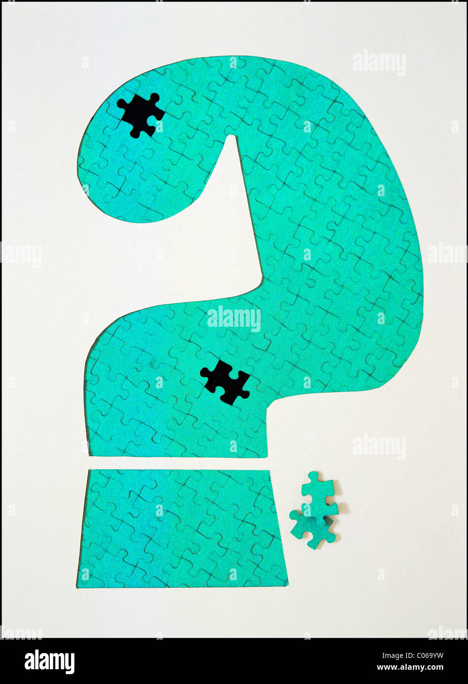 FRAGEZEICHEN, DIE MIT JIGSAW PUZZLE-TEILE Stockfoto
