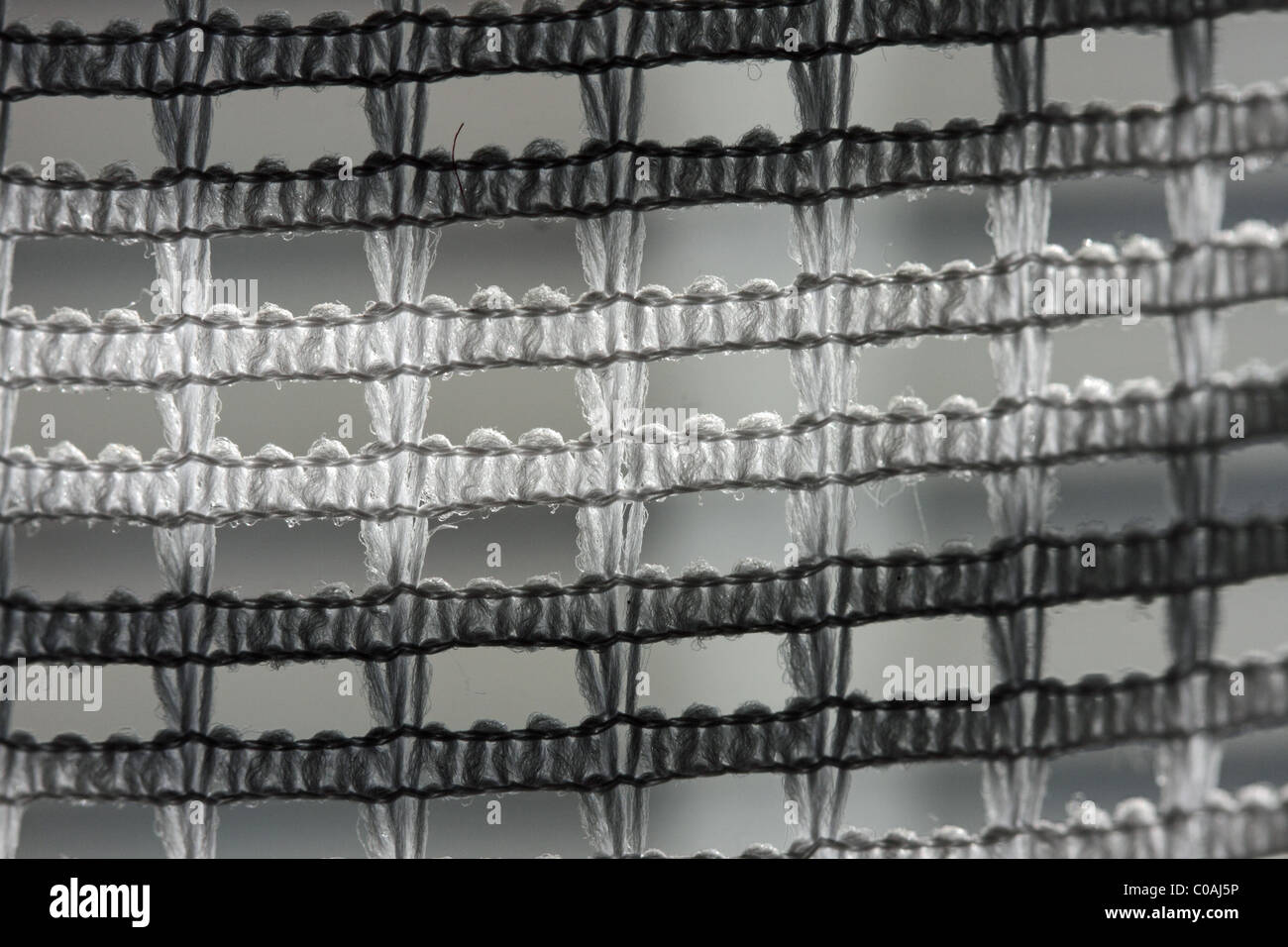 Textile Hintergrund geschnürt Spule Vorhänge Stockfoto