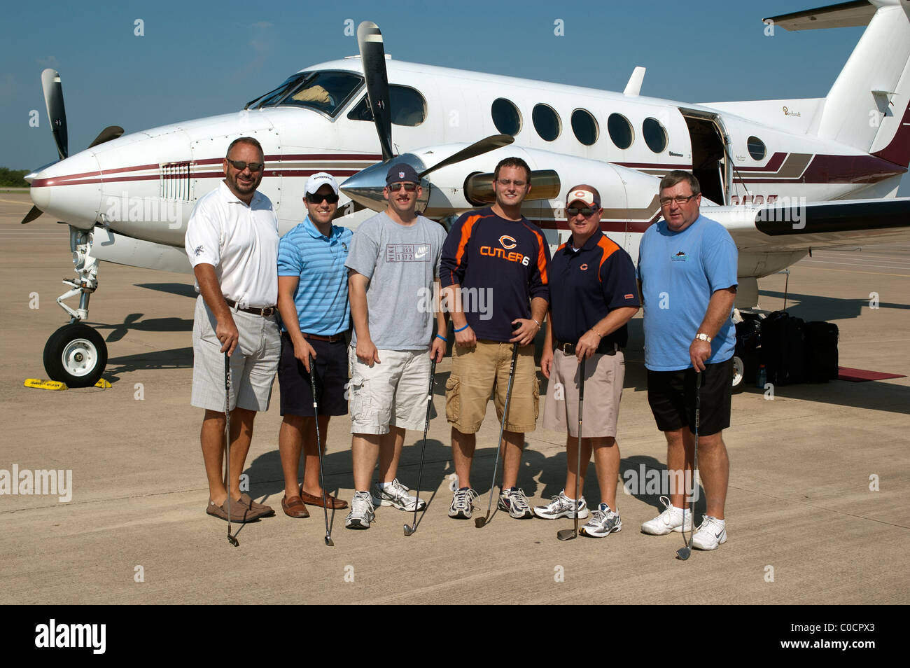 Chicago-Golf-Fans fliegen mit Privatflugzeug nach Arlington, Texas, USA, um Golf zu spielen, wo ist das Wetter besser. Stockfoto