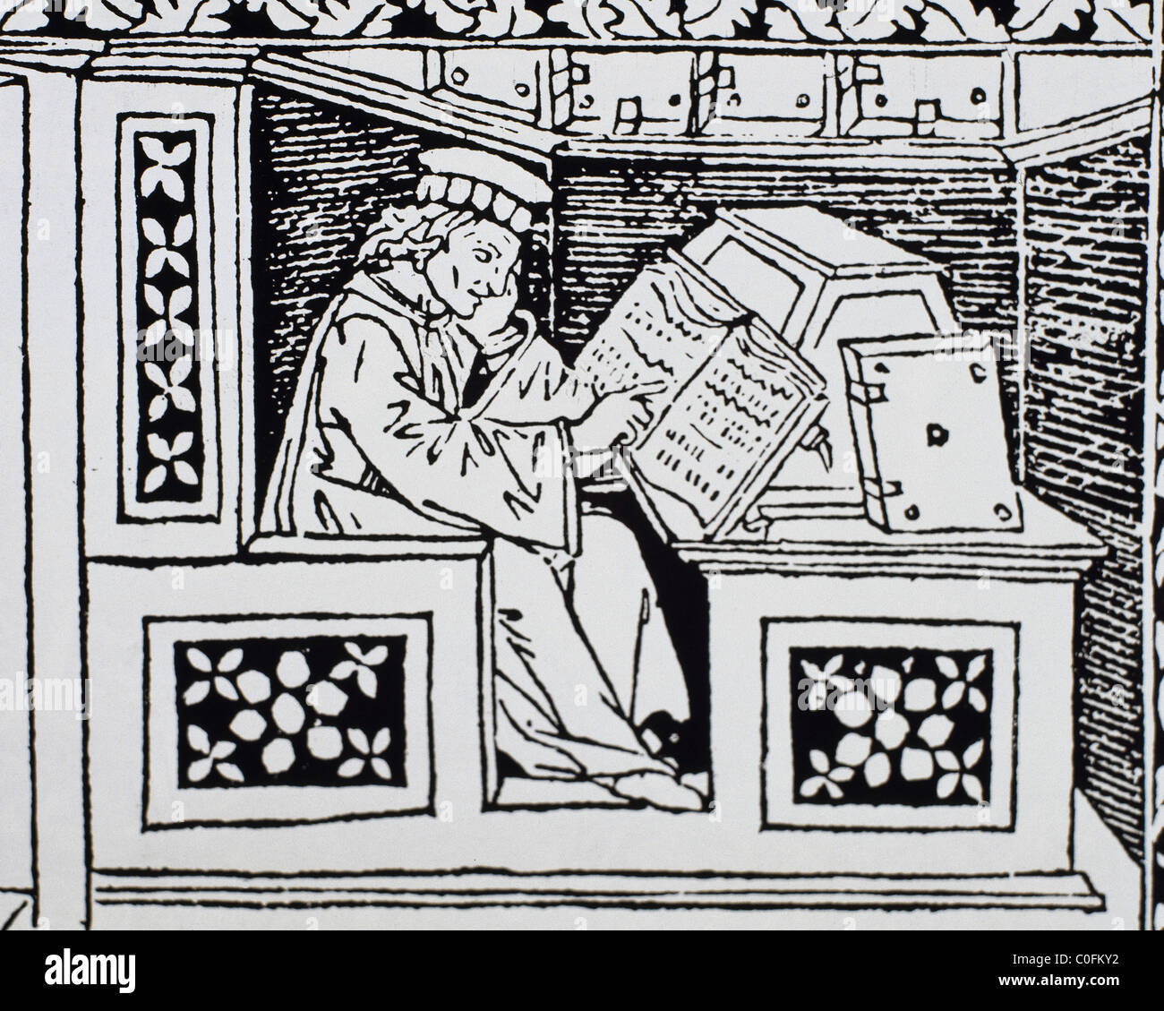 Mönch an seinem Schreibtisch. 15. Jahrhundert aus dem "Buch di Scacchi" Gravur. Stockfoto