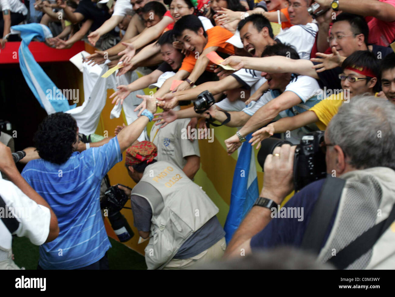 Diego Armando Maradona ist herzlich willkommen geheißen von Fußballfans Peking - 23.08.08 ** ** Stockfoto