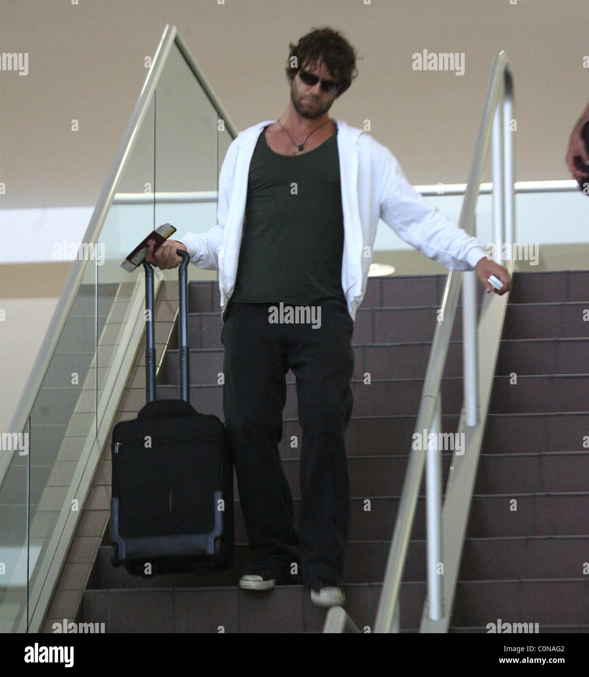 Howard Donald kommt zu LAX mit dem Rest der seine nehmen, die Kameraden an Bord einen Flug nach London Heathrow Los band international Stockfoto