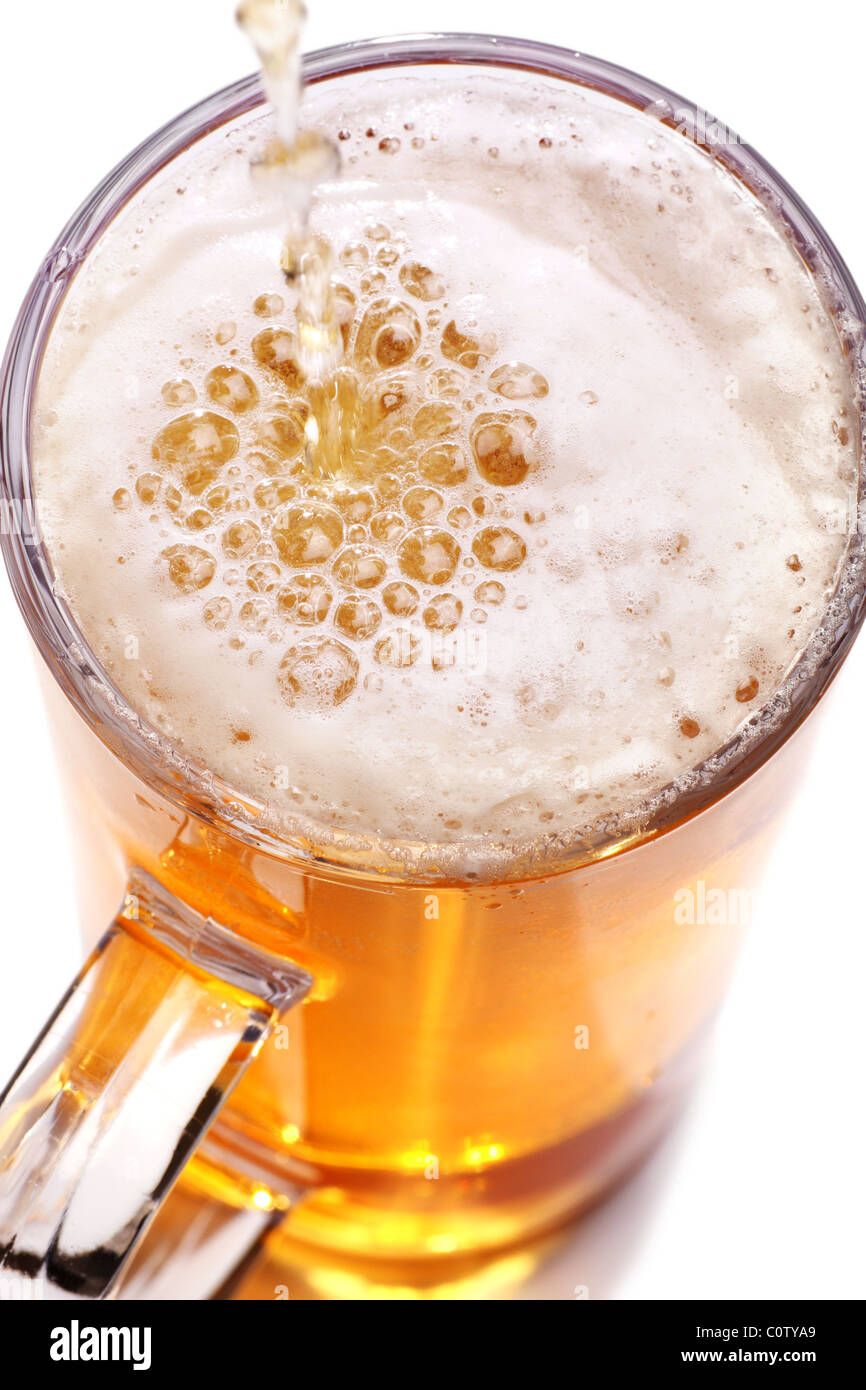 Pint Bier in einem Stein-Glas serviert. Stockfoto