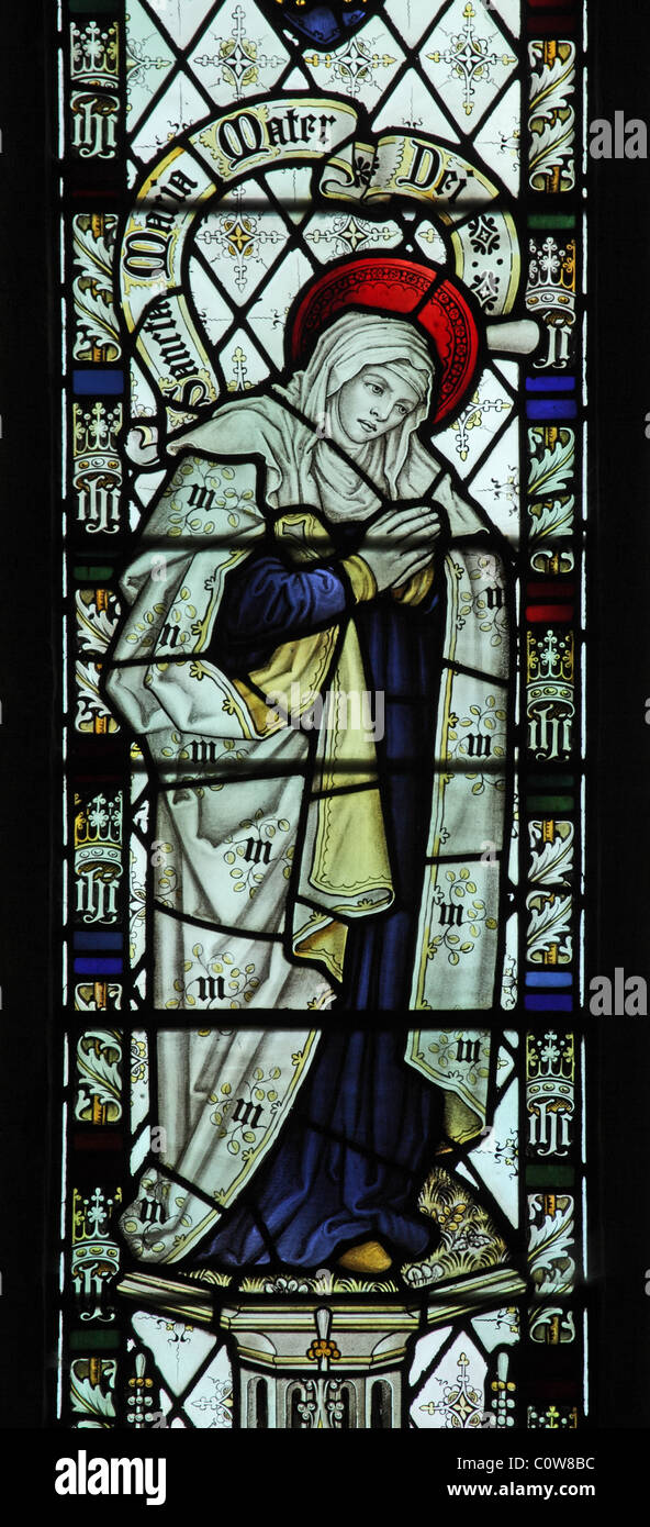Ein Glasfenster von C E Kempe & Co. Darstellung der Jungfrau Maria, All Saints Church, Braunston, Rutland Stockfoto