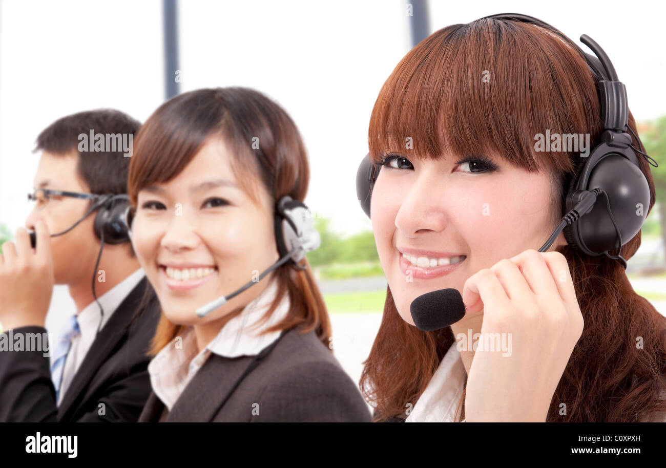 Similing Unternehmen Kundenservice am Telefon Stockfoto
