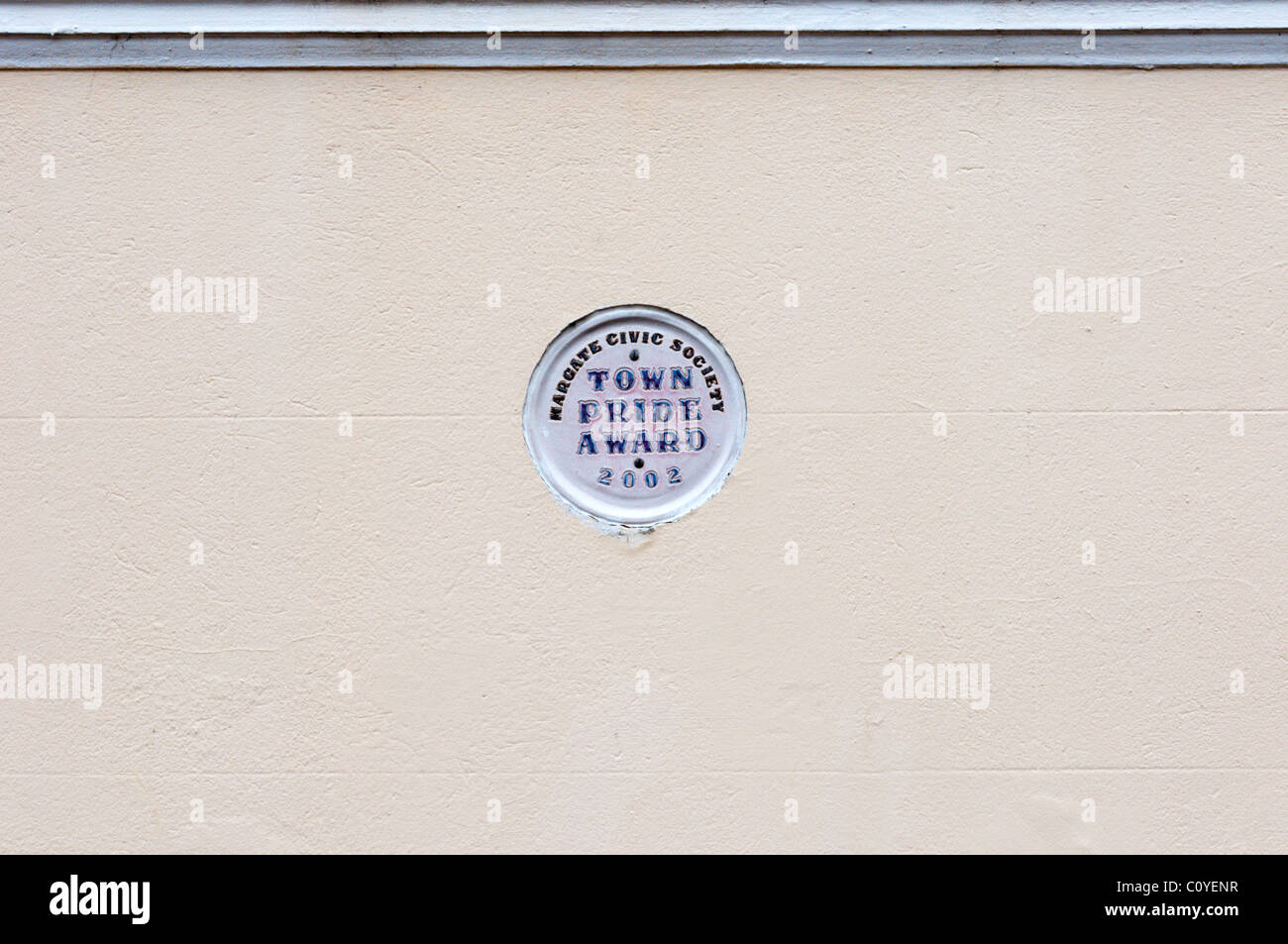 Stadt stolz Award Plaque zementiert in eine Wand Stockfoto