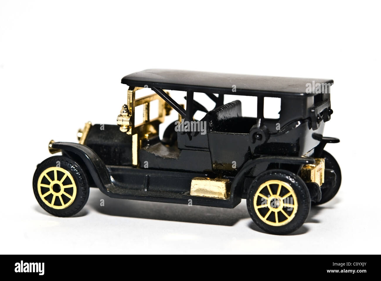 Spielzeug-Replik der einen schwarzen 4-Türer Jahrgang 1920. Stockfoto