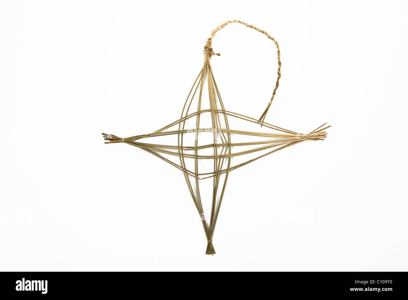 Ein Saint Brigid Kreuz aus Binsen, traditionell in Aufmachungen in Häusern in Irland, der Haushalt vor Feuer und Bösen zu schützen Stockfoto