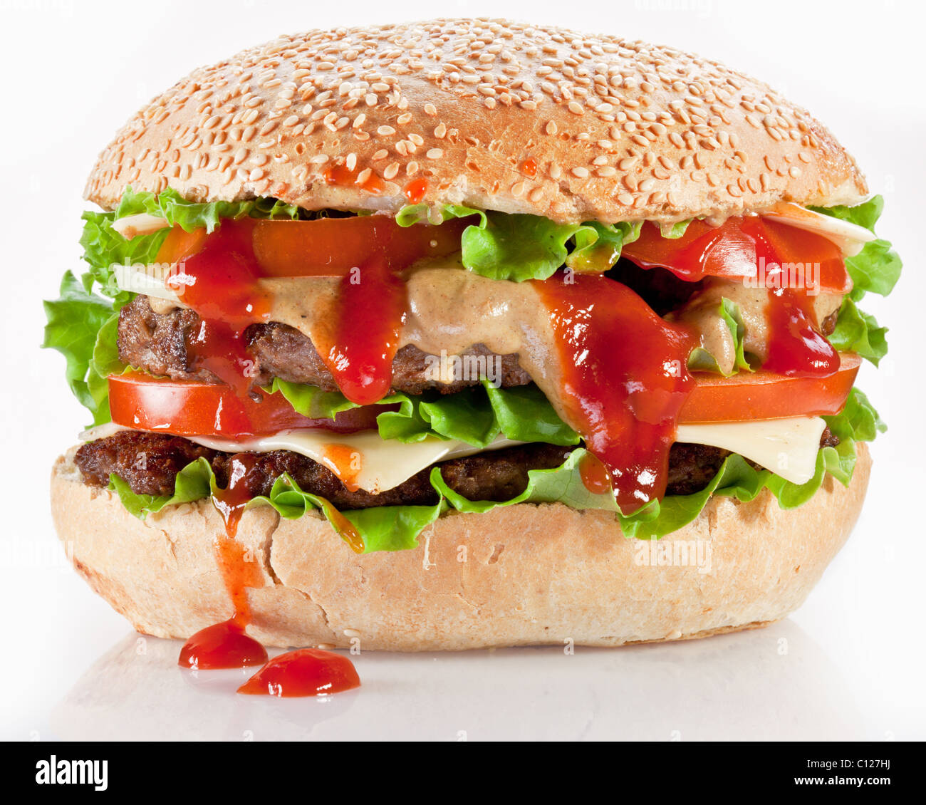 Leckere Hamburger auf weißem Hintergrund. Stockfoto