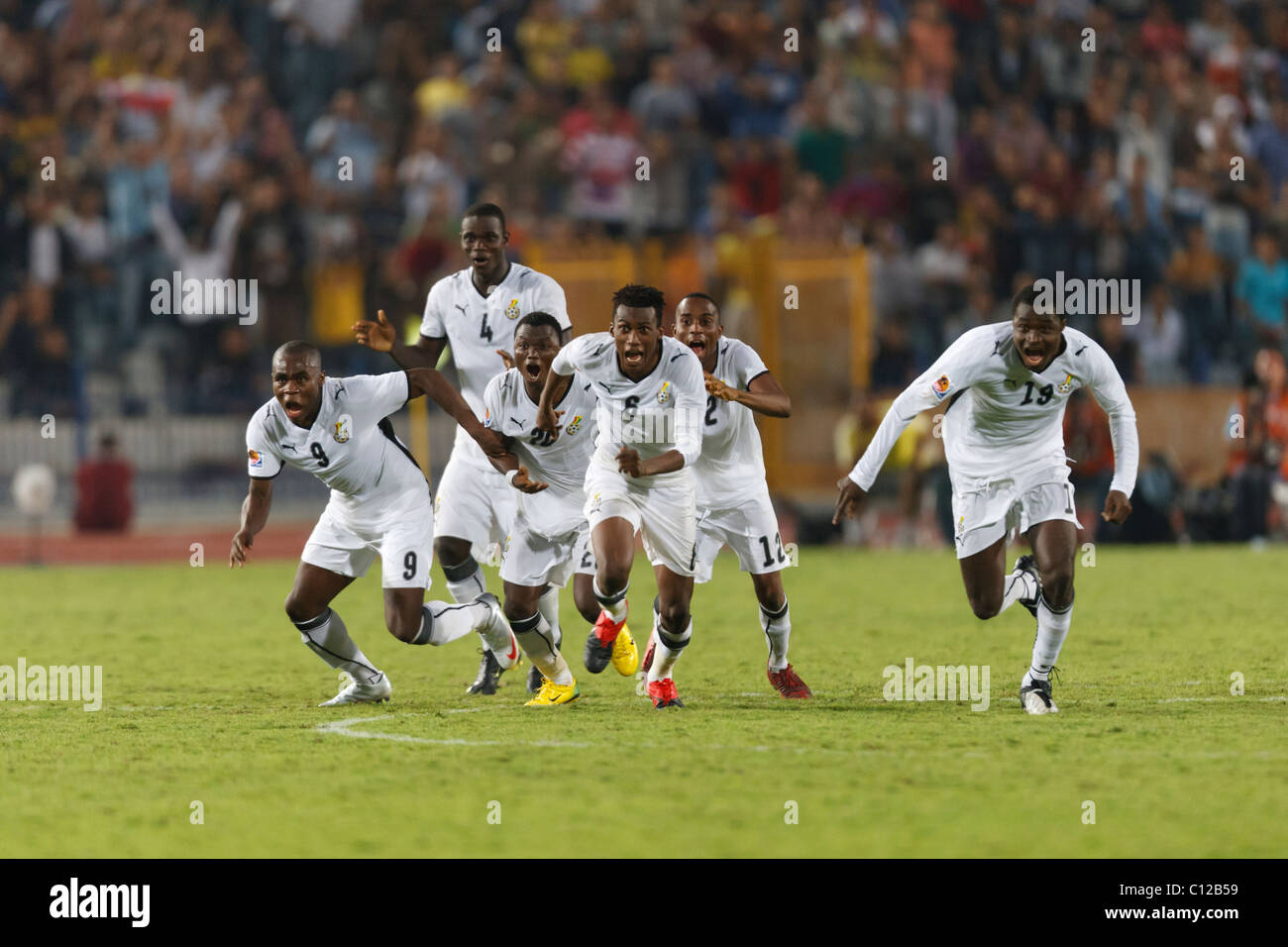 Ghana-Spieler reagieren nach dem Sieg über Brasilien in einem Elfmeterschießen Kick 2009 FIFA U-20-Weltmeisterschaft zu gewinnen. Stockfoto