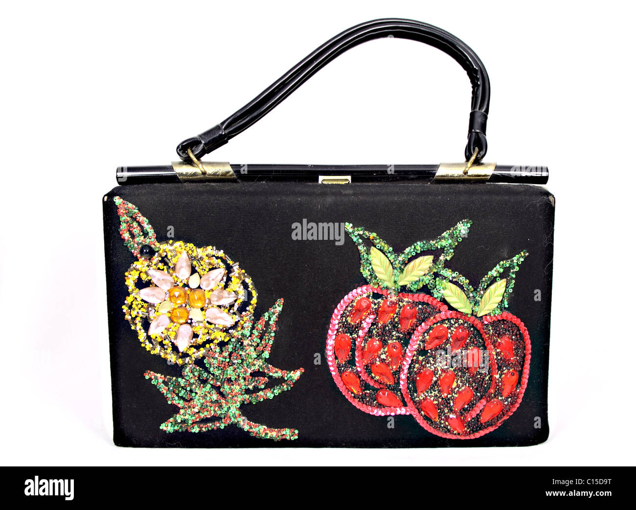 Handtasche mit Blumenmuster aus Pailletten und Glitter gemacht. Box-Tasche mit Kunststoffgriff. Stockfoto