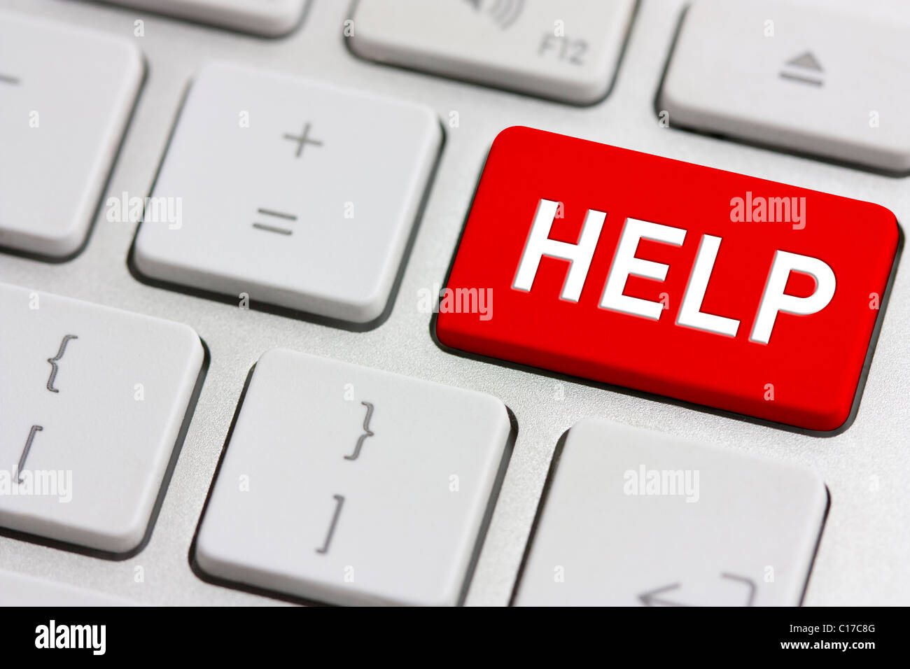 Schaltfläche "Hilfe" in rot auf einem modernen Silber-Tastatur Stockfoto