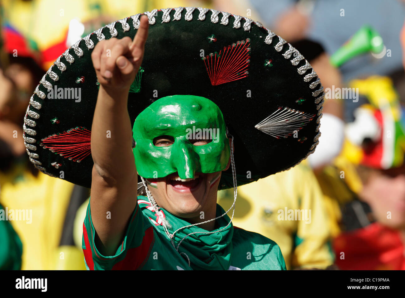 Ein Mexiko Unterstützer Gesten vor dem Eröffnungsspiel der FIFA-Weltmeisterschaft zwischen Südafrika und Mexiko 11. Juni 2010. Stockfoto