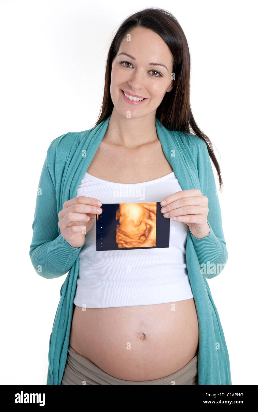 Schwangere Frau mit 4D Scan ihres Babys Stockfoto