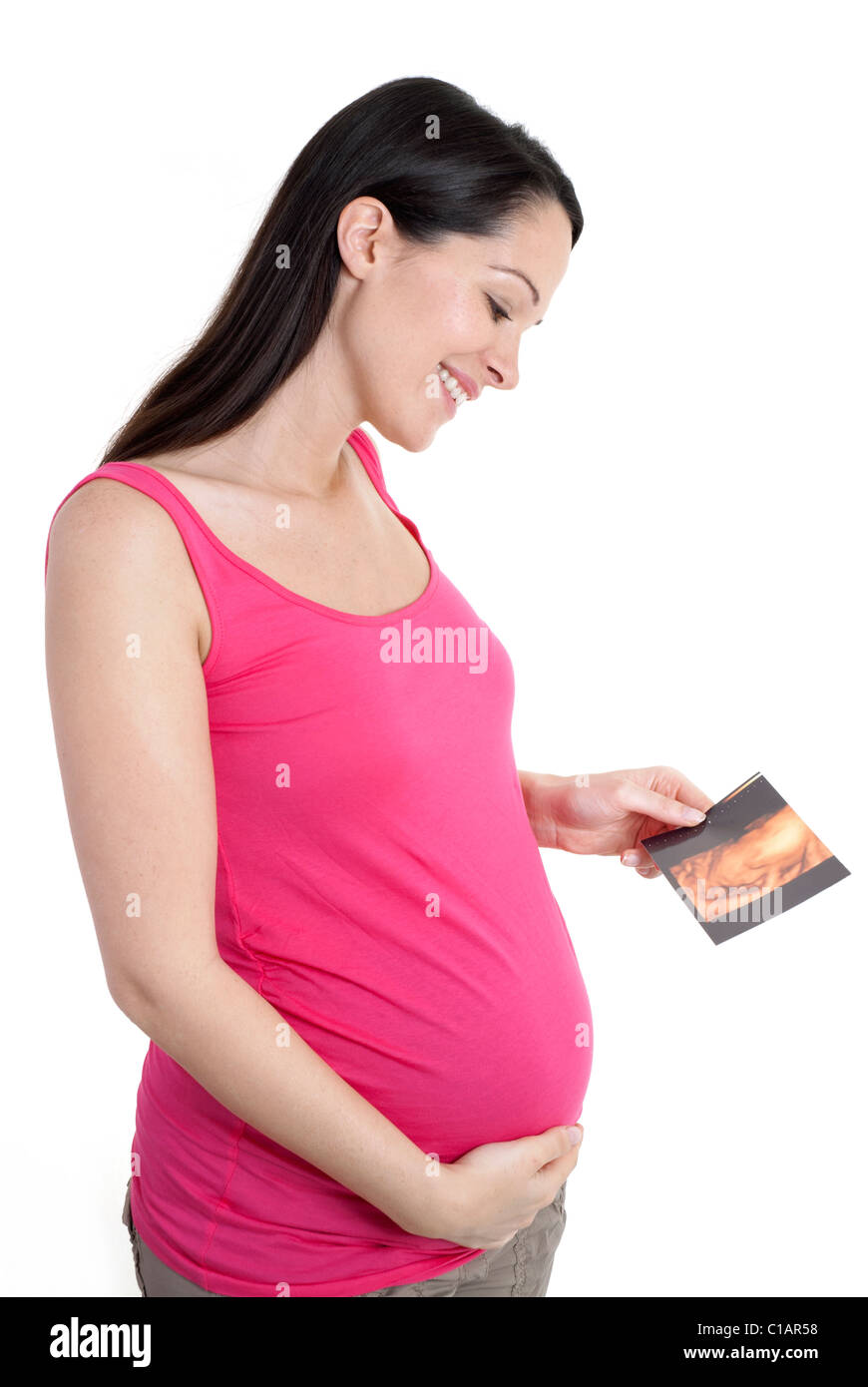 Schwangere Frau betrachten ihre 4D Scan ihres Babys Stockfoto