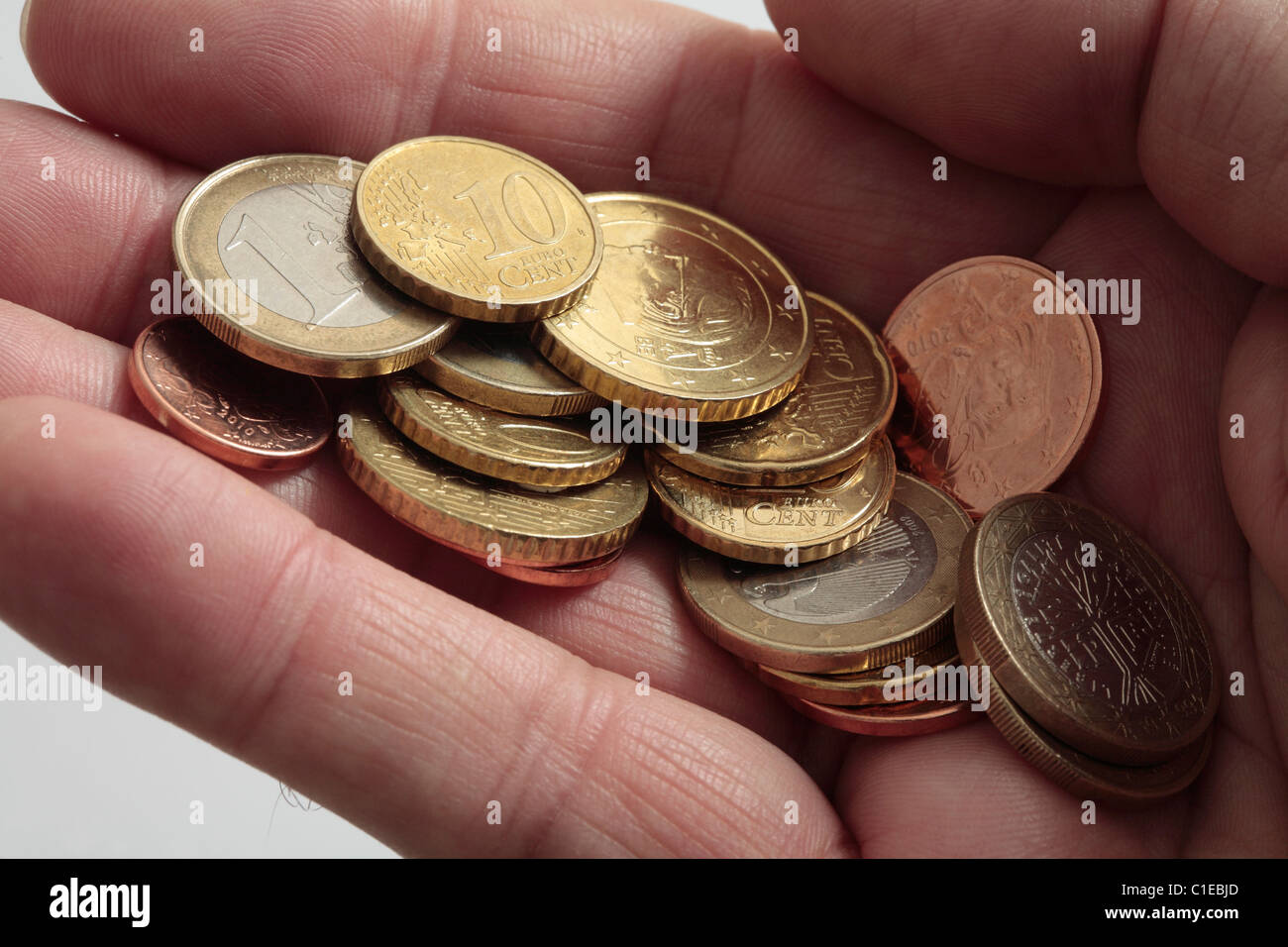 Handvoll Euro-Münzen. Stockfoto