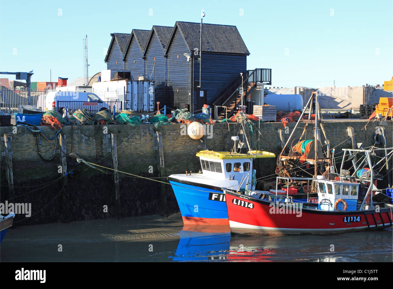 Angeln, Boote und Fischerhütten im Hafen von Whitstable, Kent, England, Großbritannien, Deutschland, UK, Europa Stockfoto