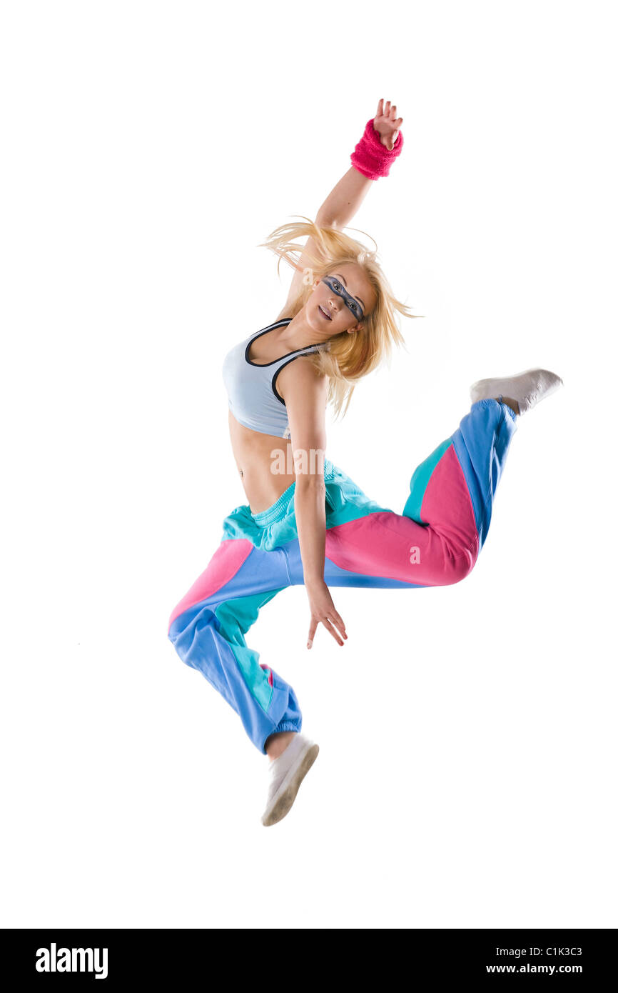 cool aussehende Tänzerin posiert isoliert auf weiss Stockfoto