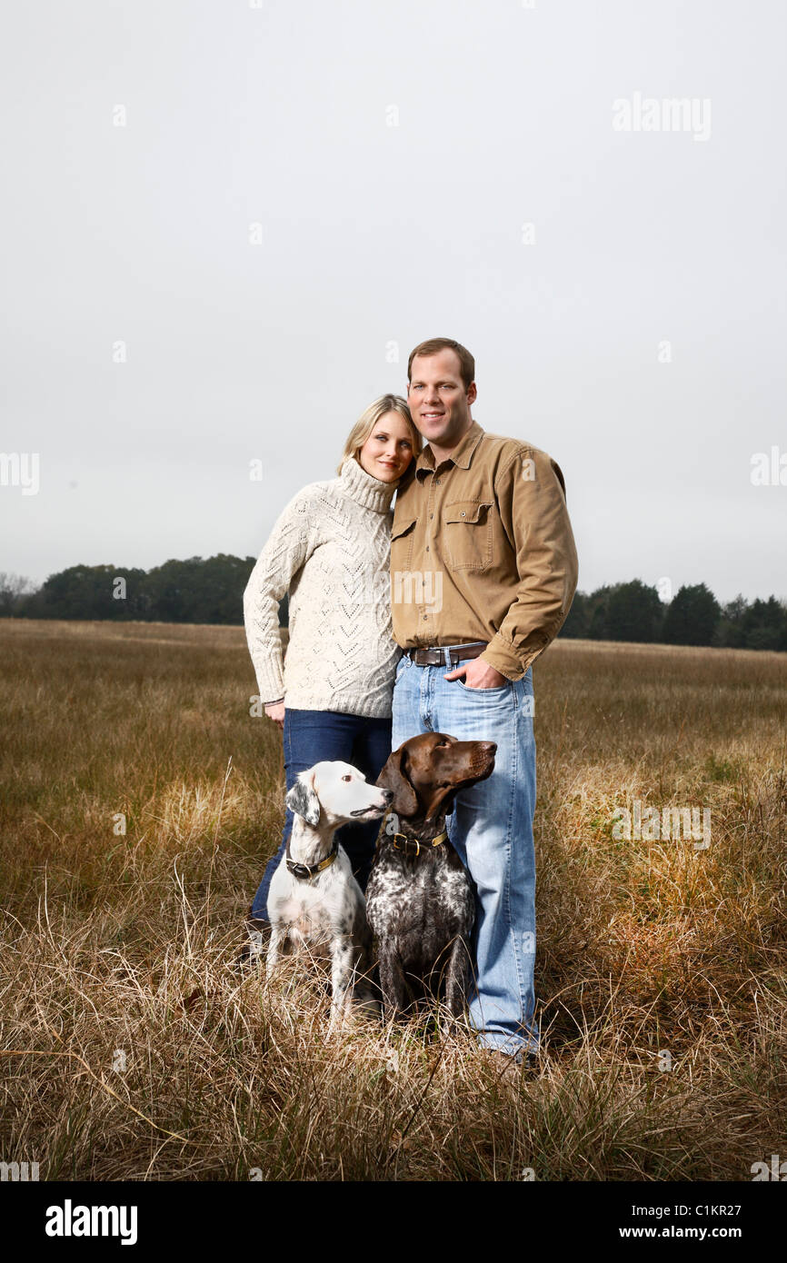 Porträt des Paares mit Hunden, Houston, Texas, USA Stockfoto