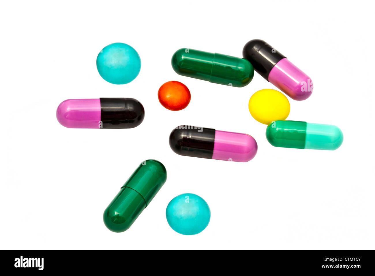 Bunte Pillen isoliert auf weißem Hintergrund Stockfoto
