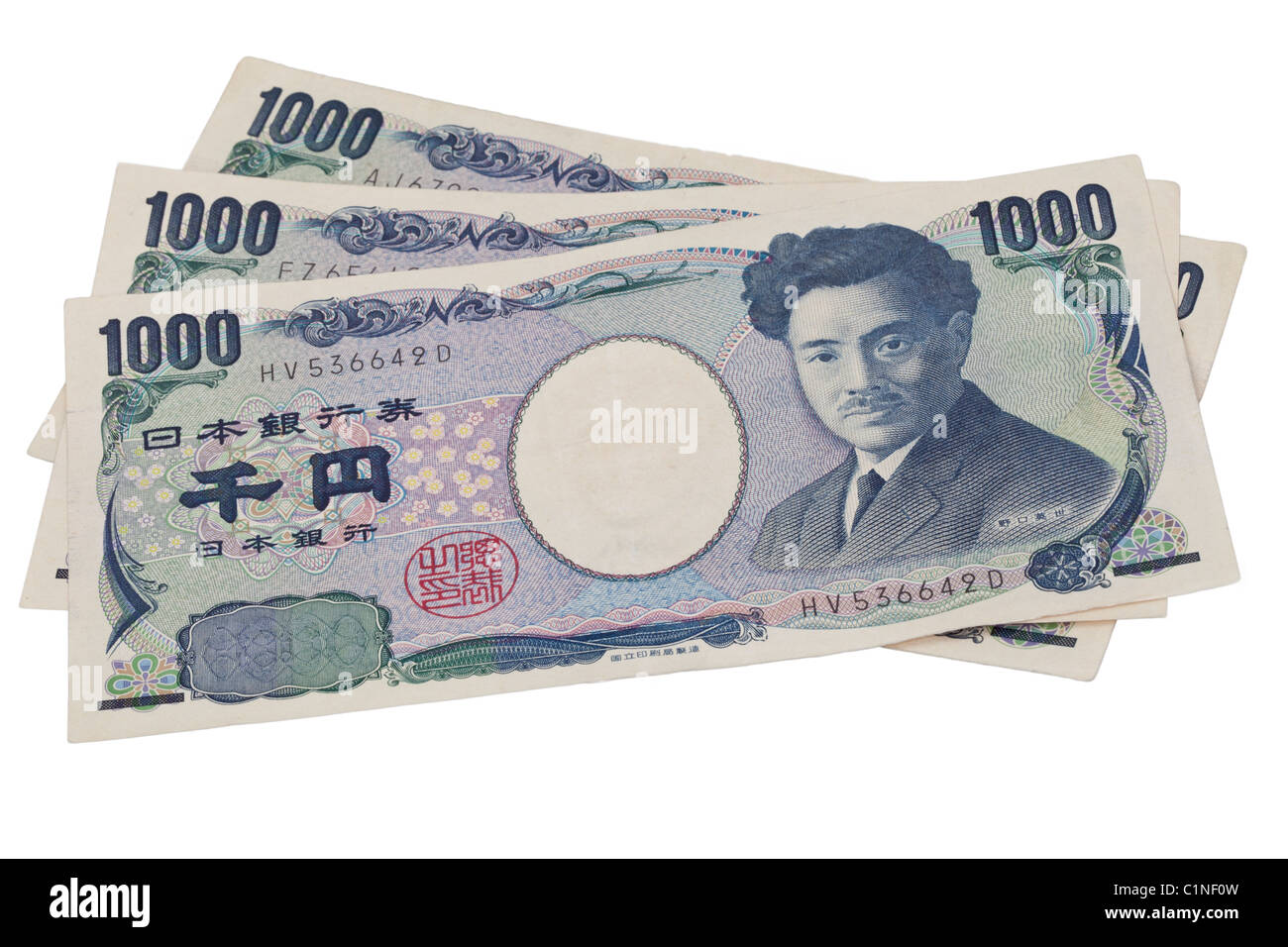 Japanischer Yen-Banknoten vor einem weißen Hintergrund isoliert Stockfoto