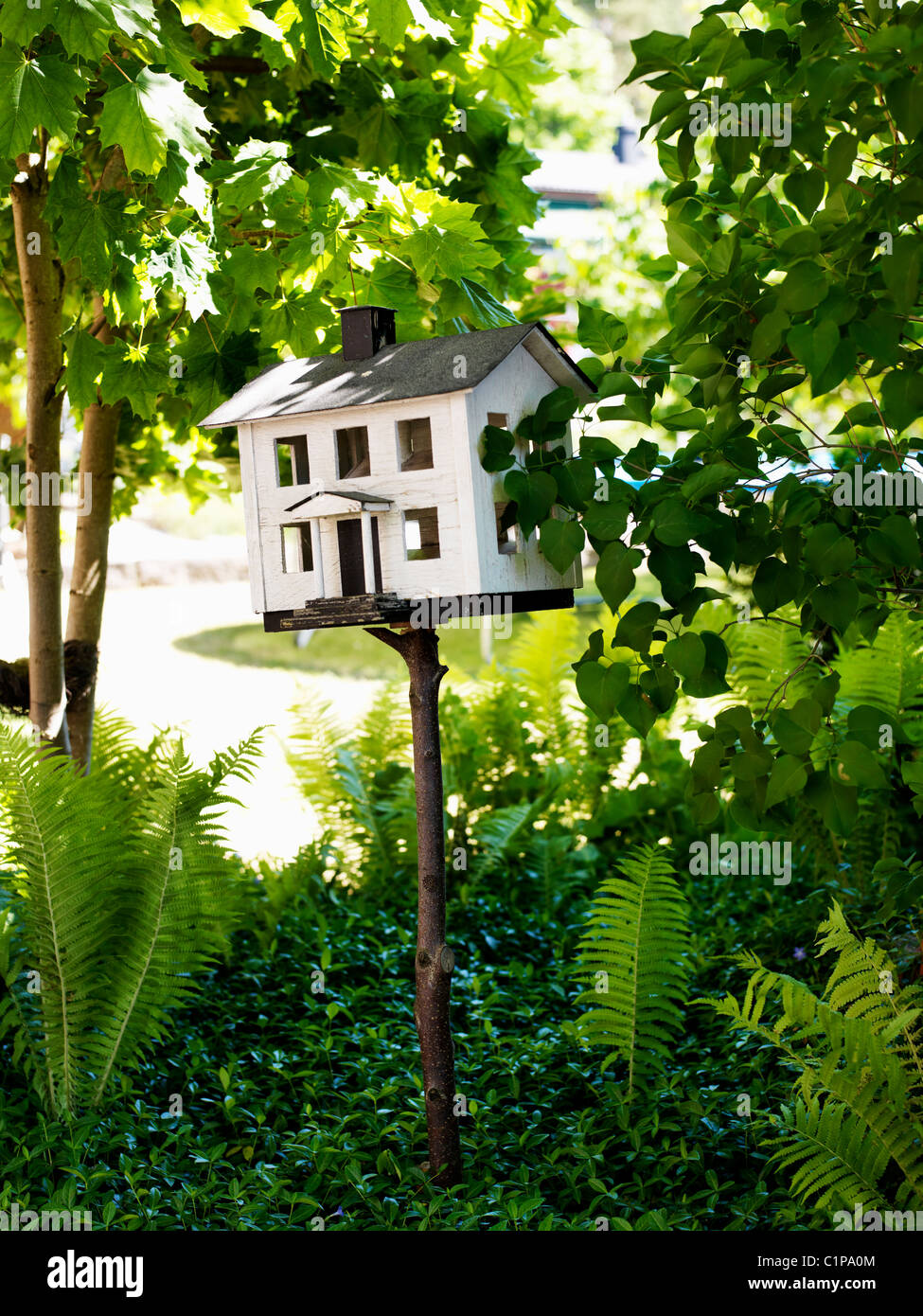 Haus-förmigen Briefkasten Stockfoto