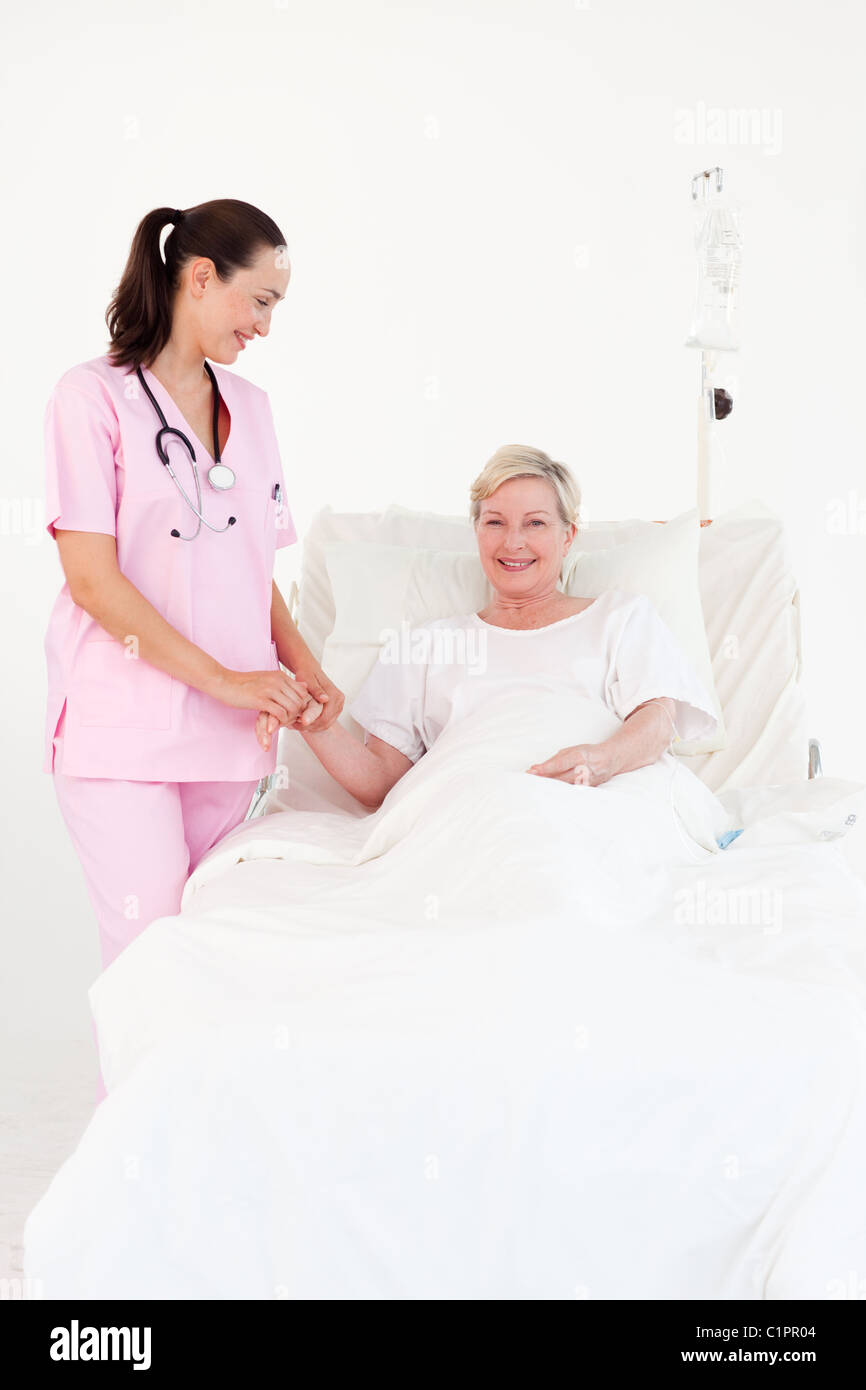 Älteren weiblichen Patienten lächelnd in die Kamera Stockfoto