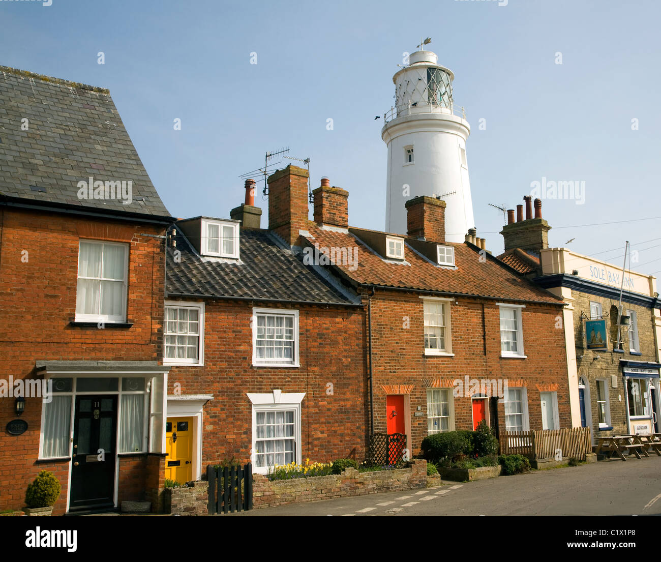 Lighthouse Sohle Bay Inn Terrasse Hütten Southwold, Suffolk Stockfoto