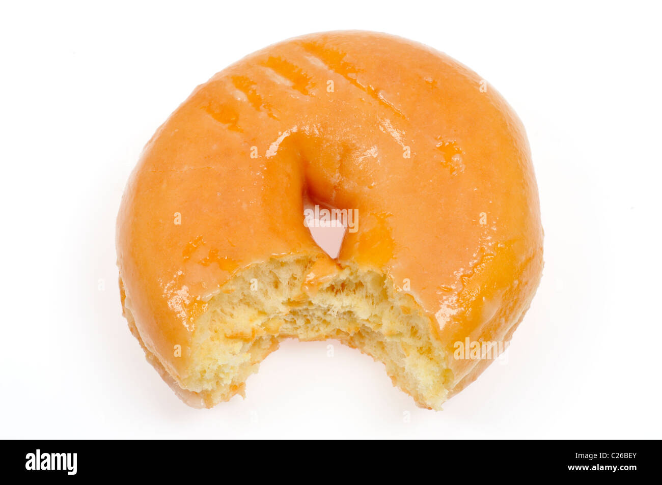 Zuckerhaltige Donut mit Bissen aus es auf weißem Hintergrund Ausschnitt genommen Verglaste Stockfoto