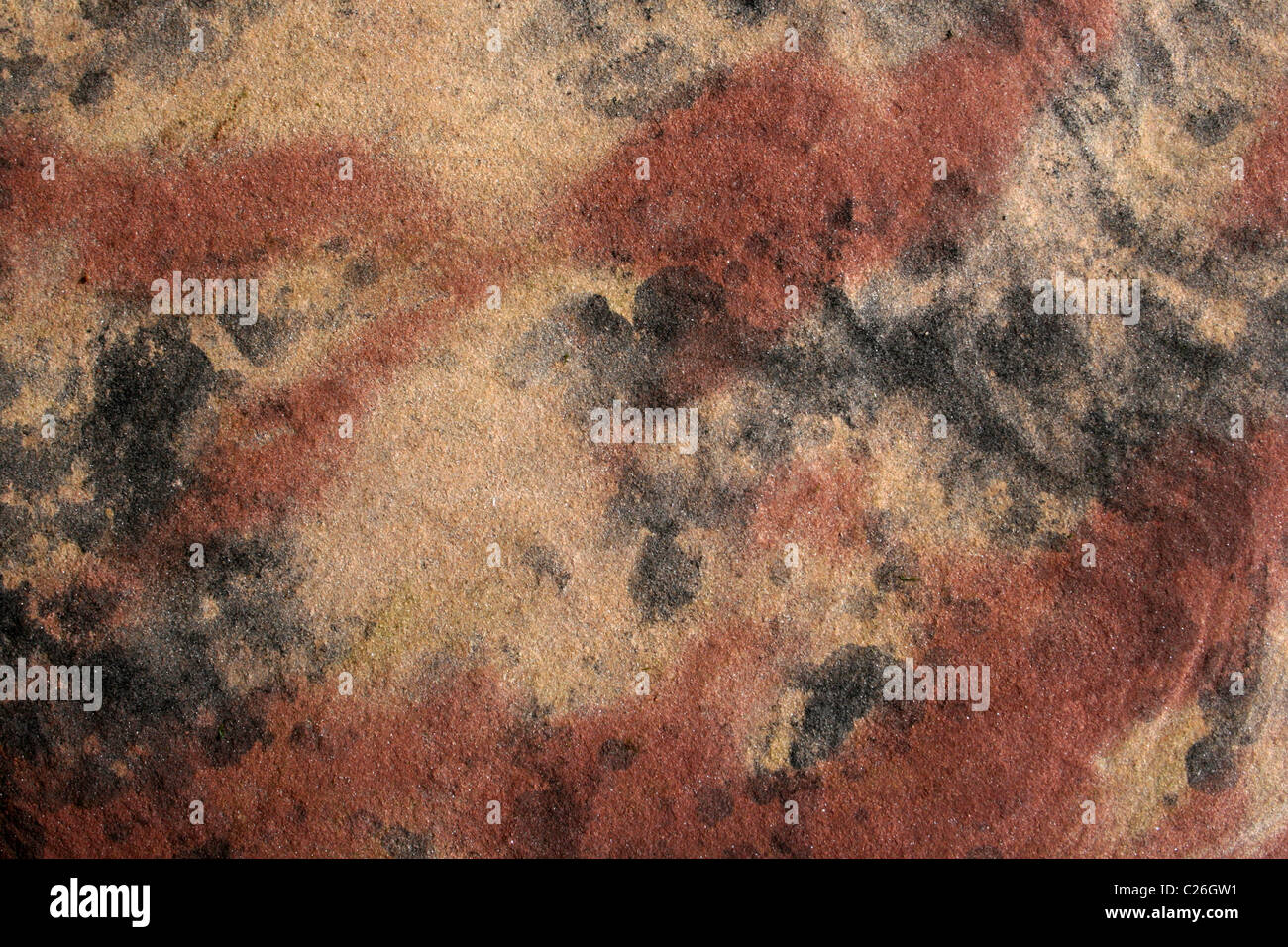 Fleckige Sandstein zeigt heller Bereiche durch Auswaschung aus dem Eisenoxid Stockfoto