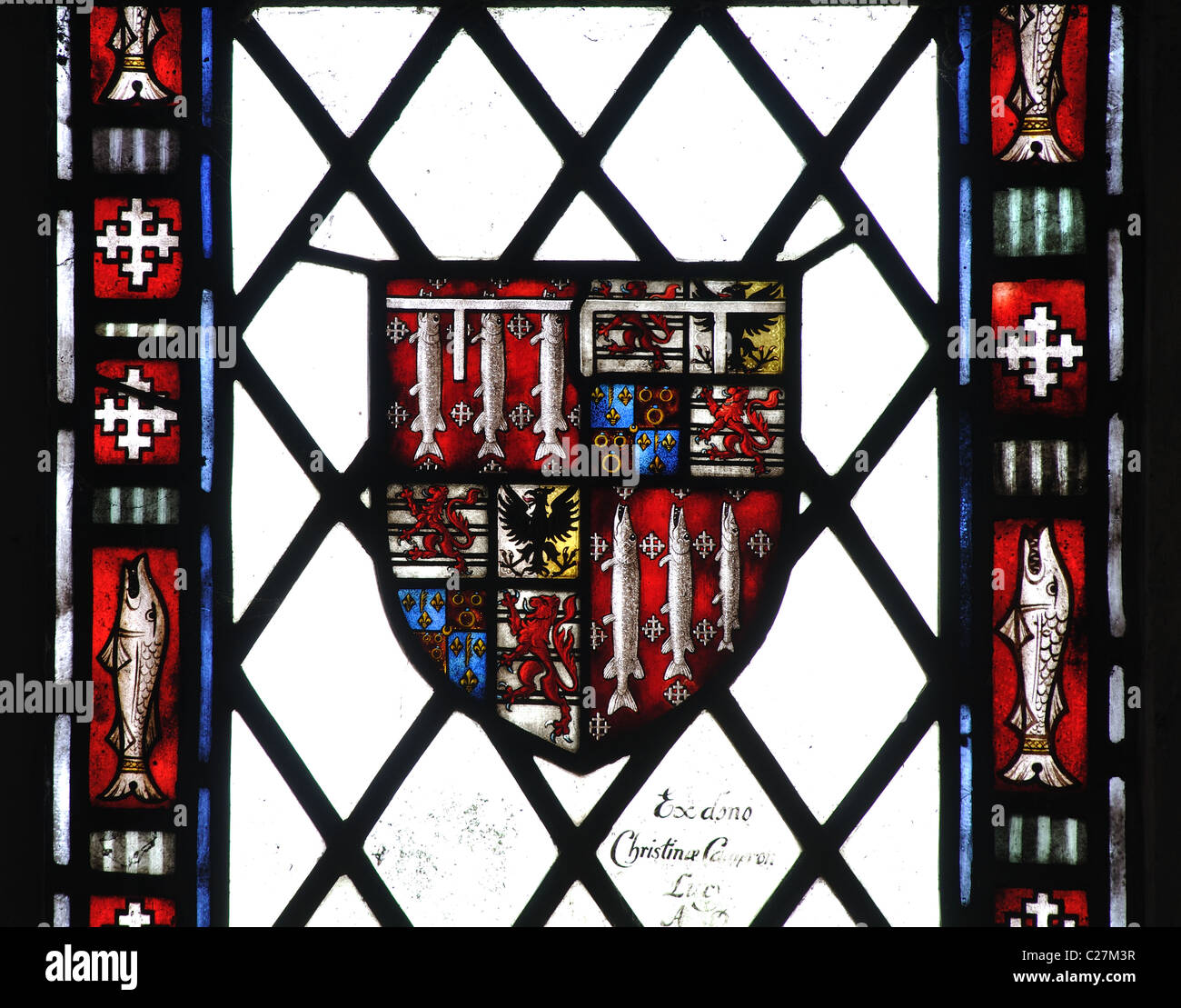 Lucy, die Wappen der Familie gebeizt Glas, Kirche St. Leonard, Charlecote, Warwickshire, UK Stockfoto