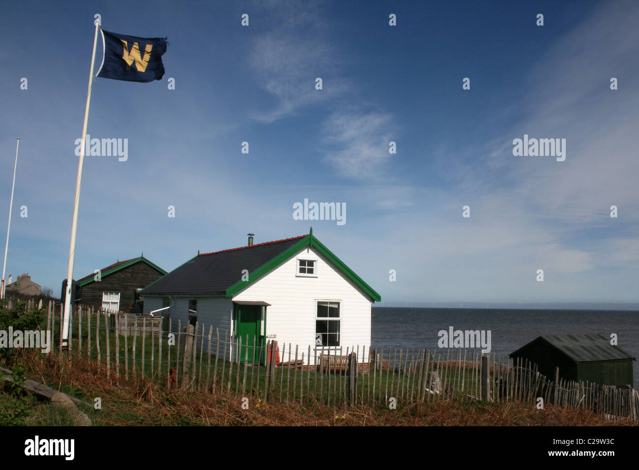 Holzhäuser auf Hilbre Insel, Wirral, UK Stockfoto