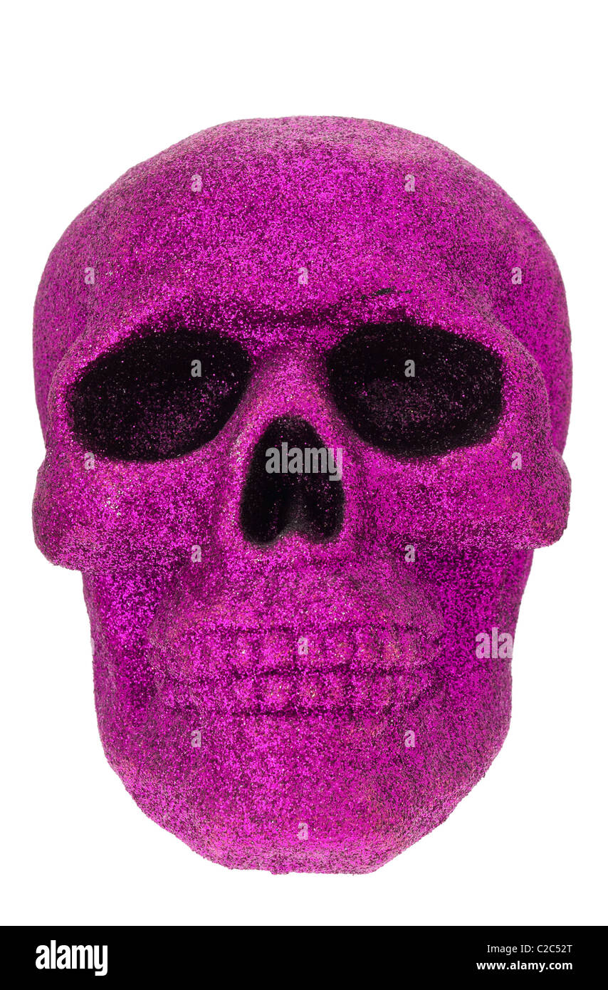Schädel in lila Glitzer bedeckt Stockfoto