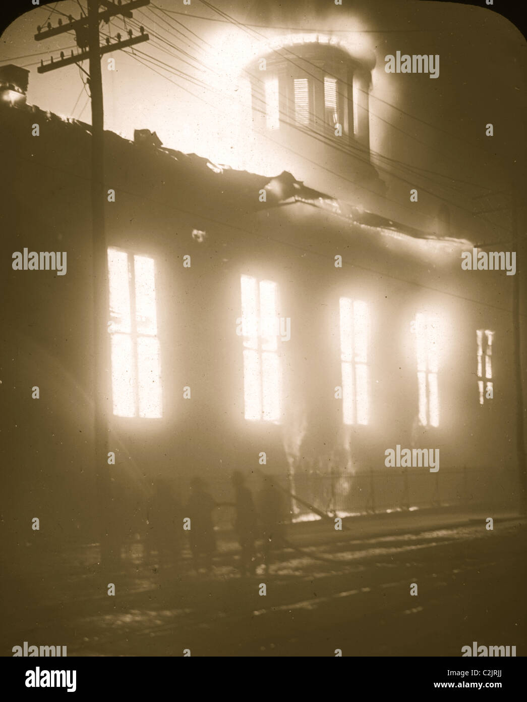 Kirche des Messias in Flammen [Baltimore Feuer, 1904] Stockfoto