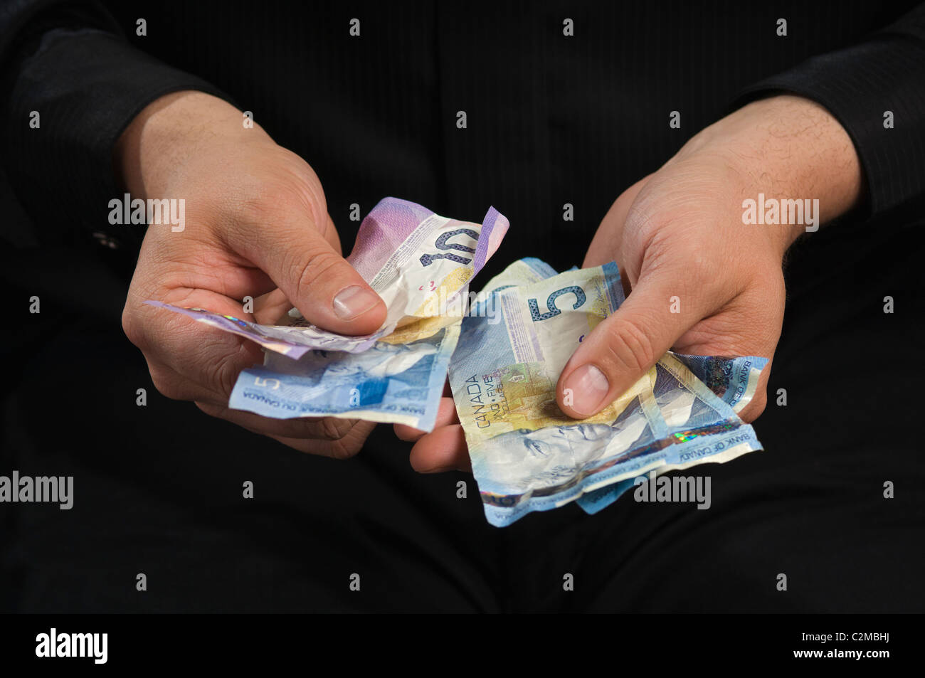 Faust voller Bargeld Stockfoto