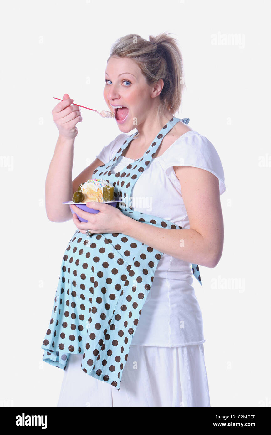 Schwangere Frau Essen Junkfood Stockfoto
