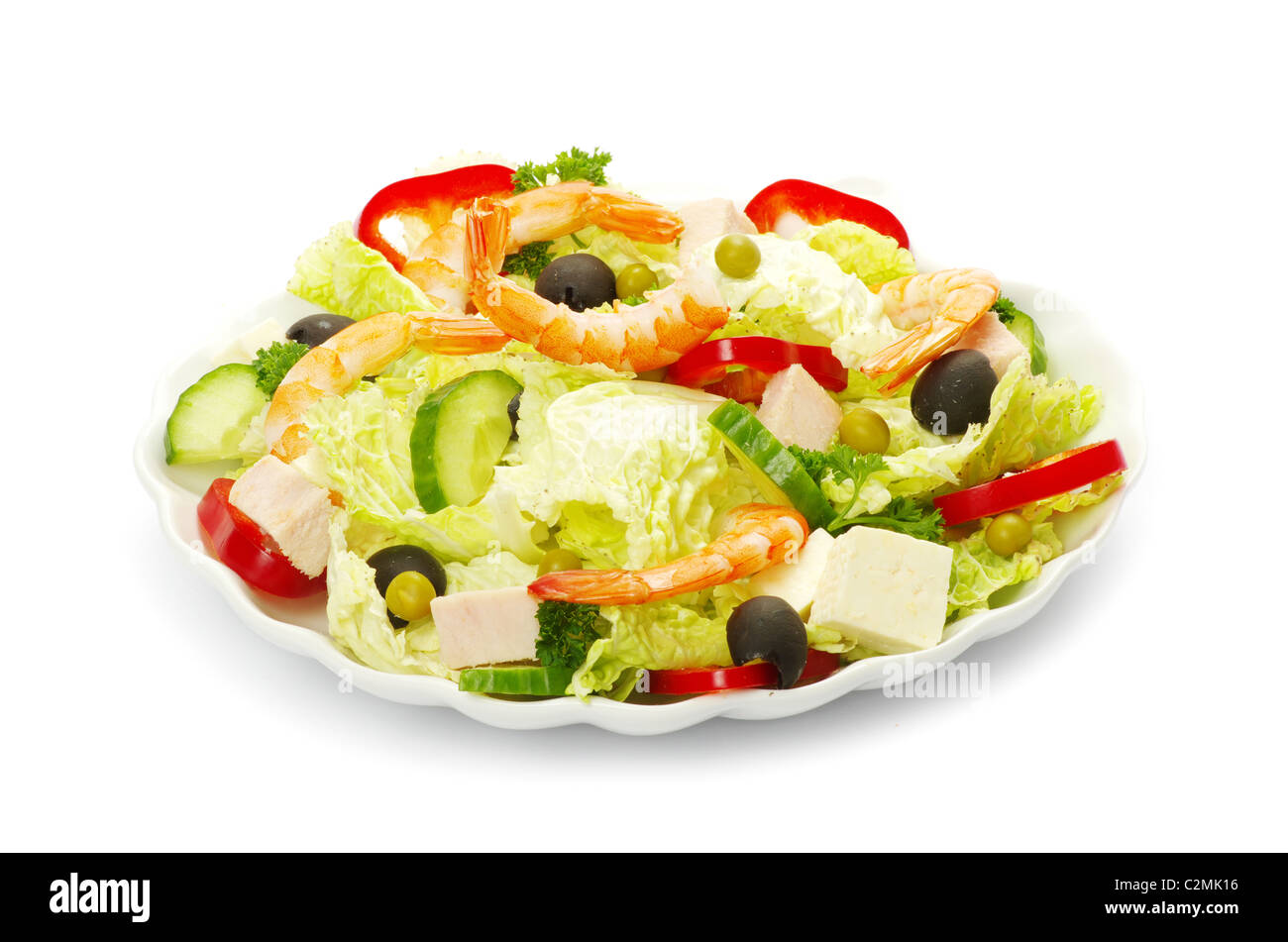Salat in Platte auf weiß Stockfoto