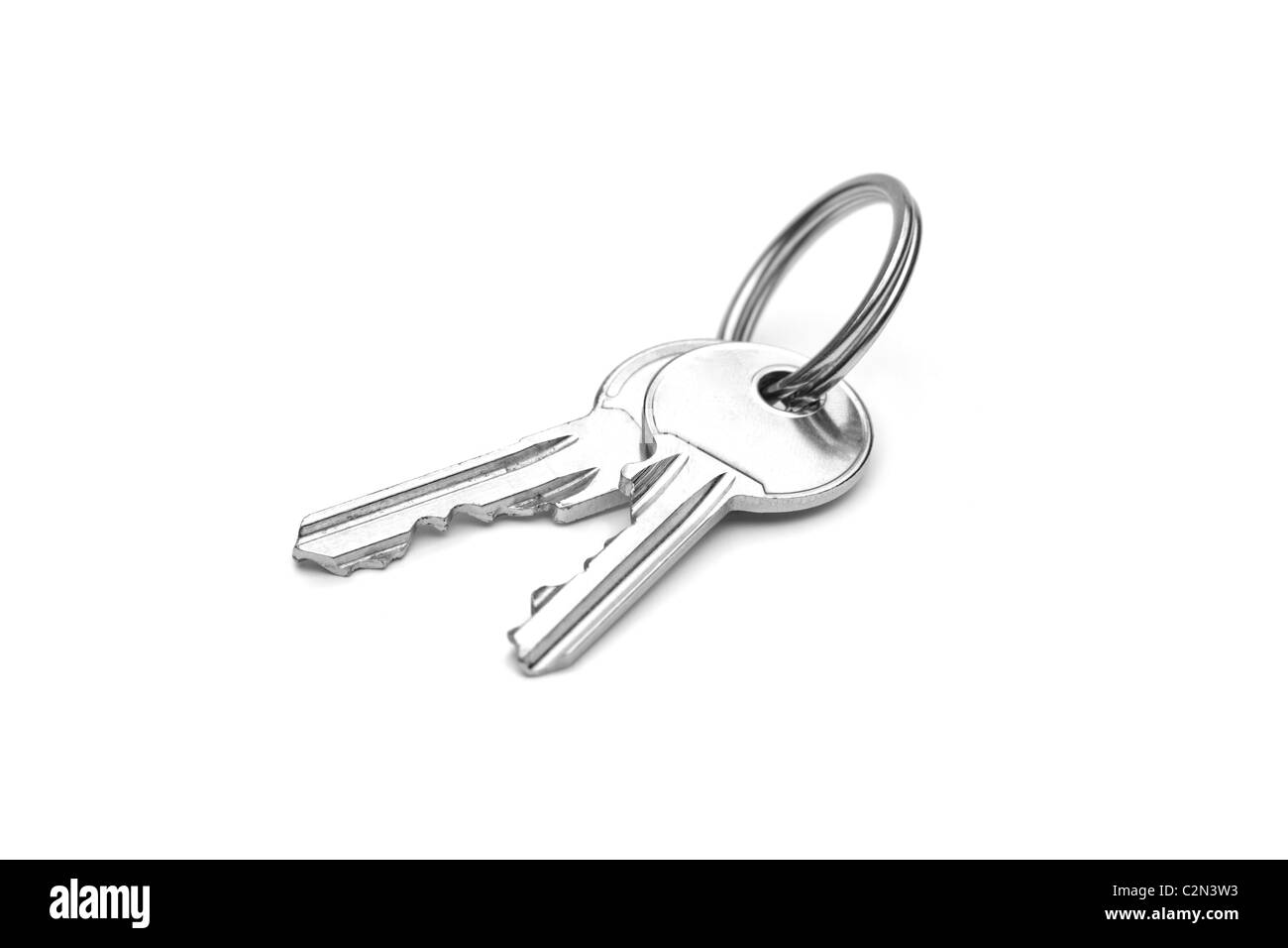 Ein Schlüsselpaar isoliert auf weiss Stockfoto