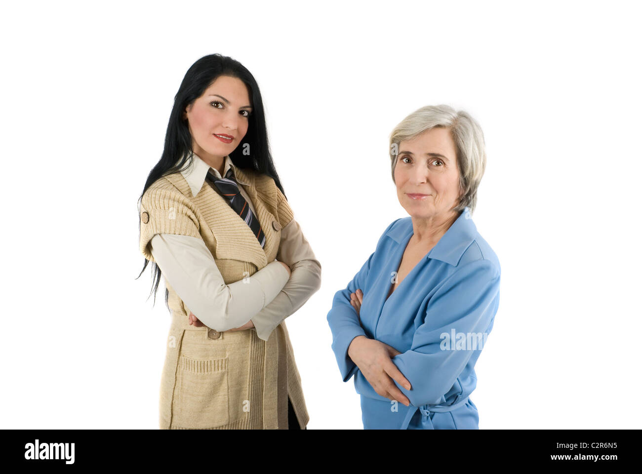 Moderne Business-Frau, Senior und junge Frau Gesichter, Chef und Mitarbeiter oder nur Mitarbeiter Blick in die Kamera Stockfoto