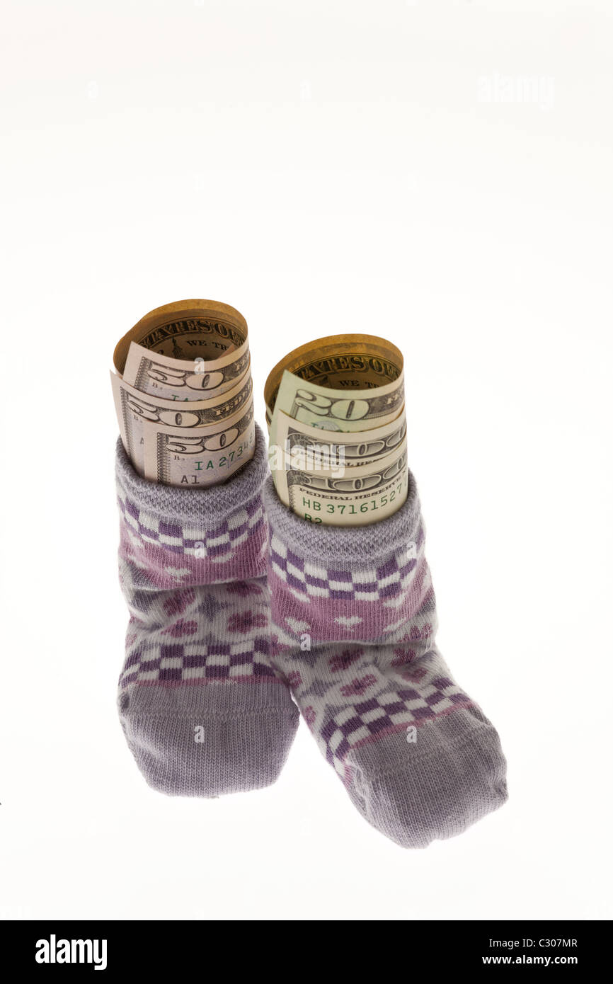 Kinder Socken mit Dollarnoten Stockfoto