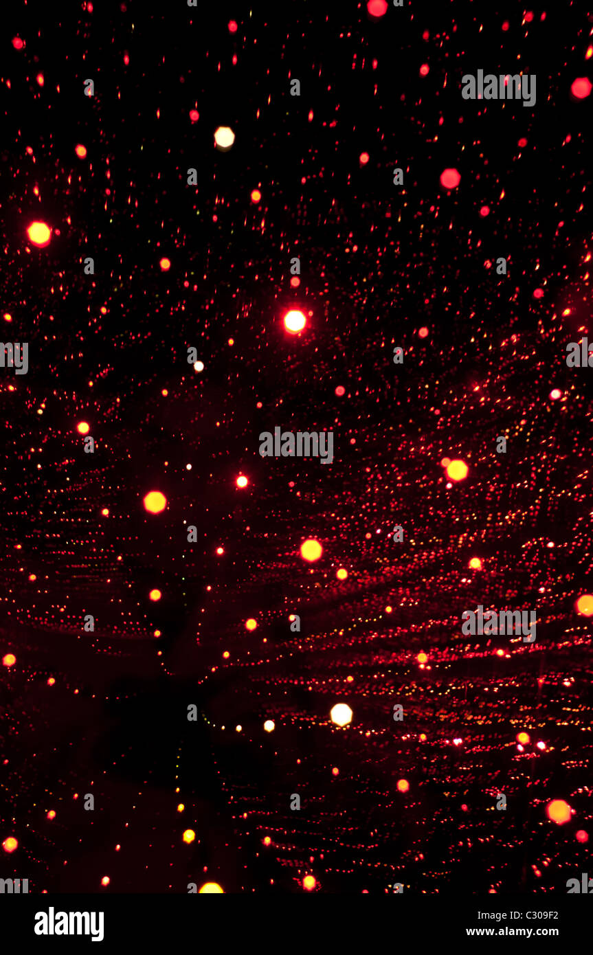 Leichte Infinity zeigt Spuren von gelb, orange und rote Lichter Stockfoto